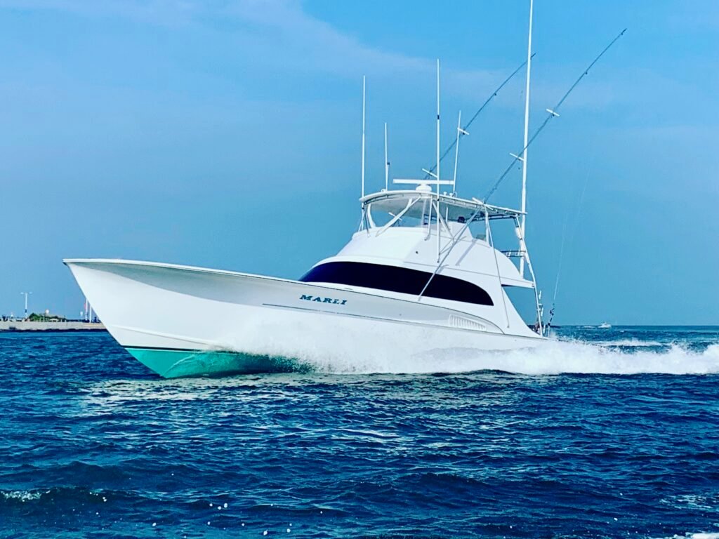 Sportfishing convertible running offshore