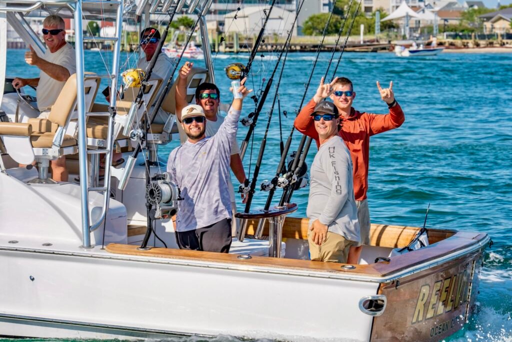 The crew on ReelVille celebrating their catch. 78lb White in the MidAtlantic