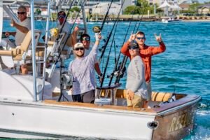 The crew on ReelVille celebrating their catch. 78lb White in the MidAtlantic
