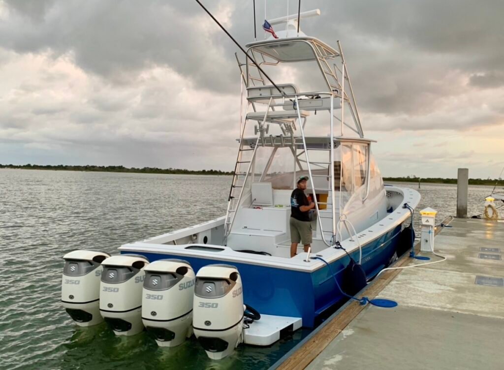 Sportfisher powered by quad Suzuki outboards. She's got to be fast!
